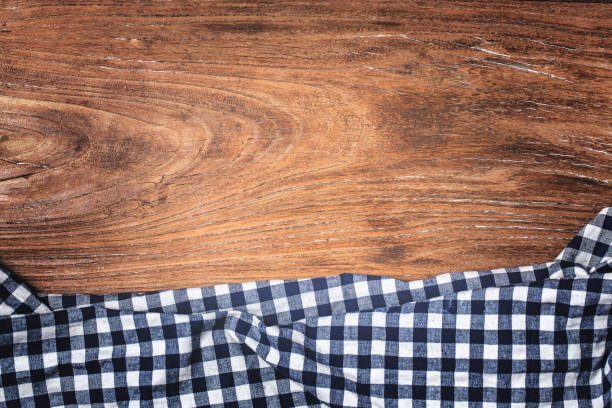 istock Tartan, wooden background 834646256
