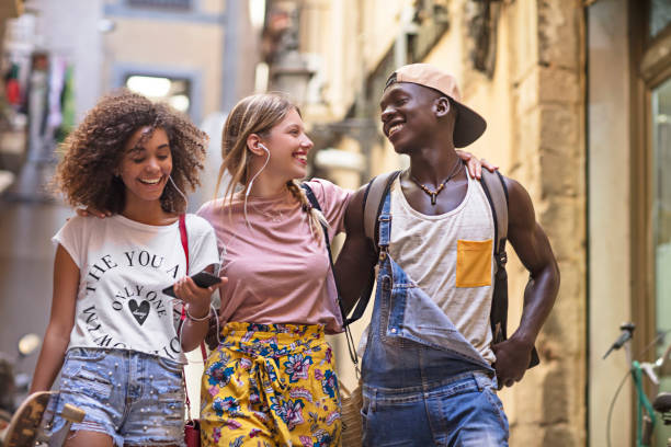 istock Friends having fun around in the city 834656892