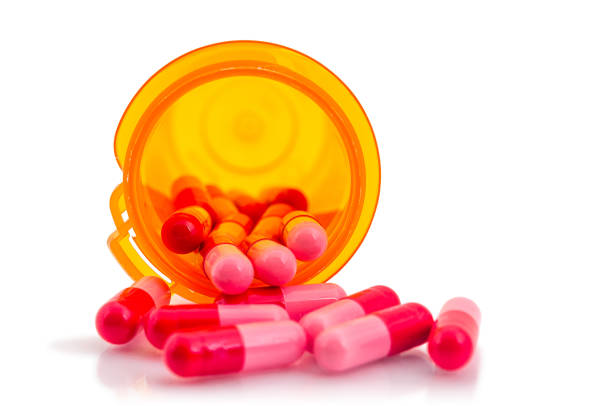 의학 캡슐세제 - capsule vitamin pill red orange 뉴스 사진 이미지