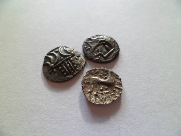 Collection Of 1st Century Boudicca Iceni Hammered Coins Set of Boudicca/Boadicea-era ancient Briton Iceni tribe hammered coins dated 1st century AD. Various types including ECEN, ANTED and Norfolk God; also displaying the iconic double crescent symbol on the reverse. Norfolk, England, UK. boadicea statue stock pictures, royalty-free photos & images