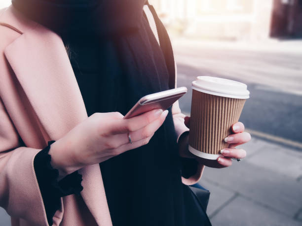 istock Young woman using with her mobile phone 834694804