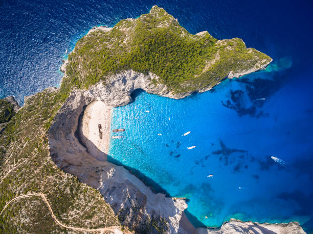 Aerial  view of Navagio beach Shipwreck view in Zakynthos (Zante) island, in Greece Aerial  view of Navagio beach Shipwreck view in Zakynthos (Zante) island, in GreeceAerial  view of Navagio beach Shipwreck view in Zakynthos (Zante) island, in Greece greek islands stock pictures, royalty-free photos & images