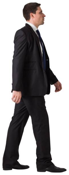 istock Handsome businessman in suit stepping 834705702
