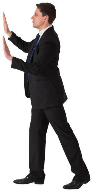 istock Businessman in suit pushing with hands 834710584