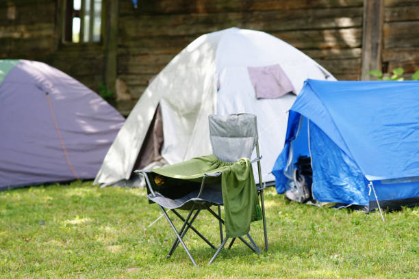 istock Armchair near a touristic tent 834728874