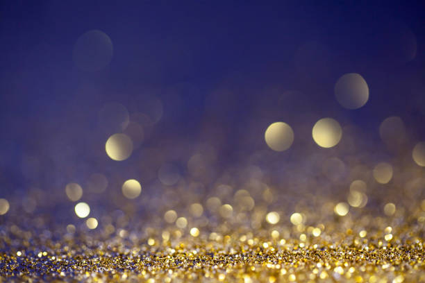istock Abstract gold color bokeh background 834729674