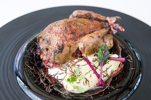 Pigeon de racan roti or roast pigeon is a traditional french culinary dish.