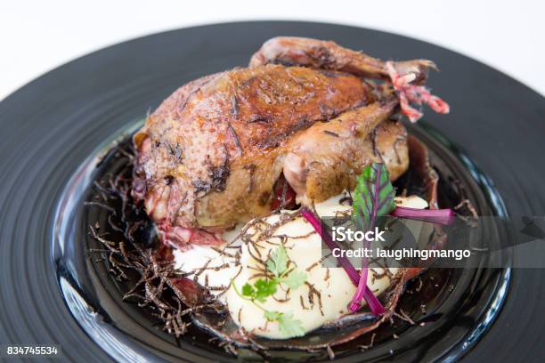 Roast Pigeon By Racan Roti Stock Photo - Download Image Now - Crockery, Roasted, Squab - Pigeon Meat