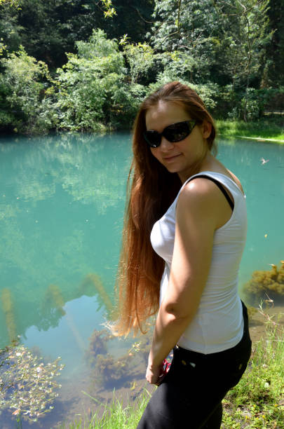 istock Beautiful Girl and  the river 834746102