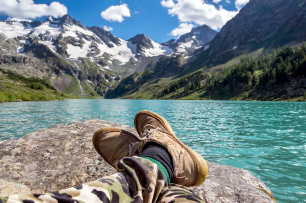 istock Man sitting with his legs straight stretch 834749540