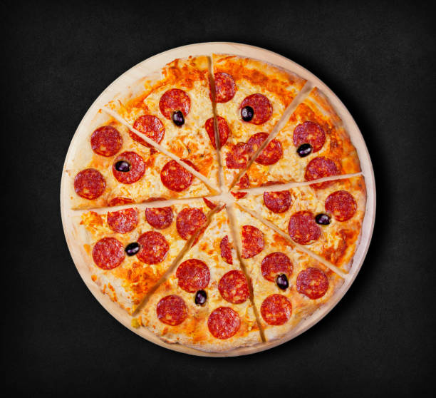 istock Pepperoni pizza on a black background. 834756292