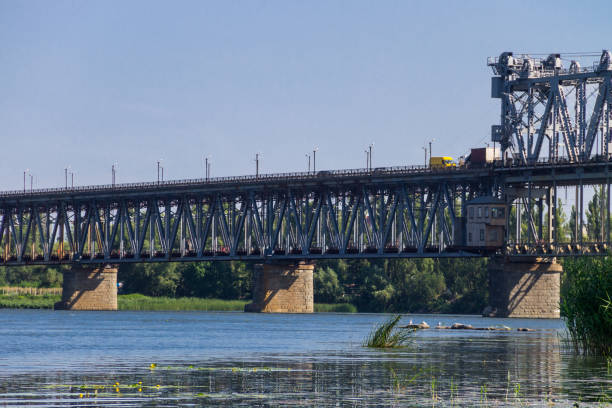 istock Bridge with traffic over the Dnieper river in Kremenchug, Ukraine 834757686