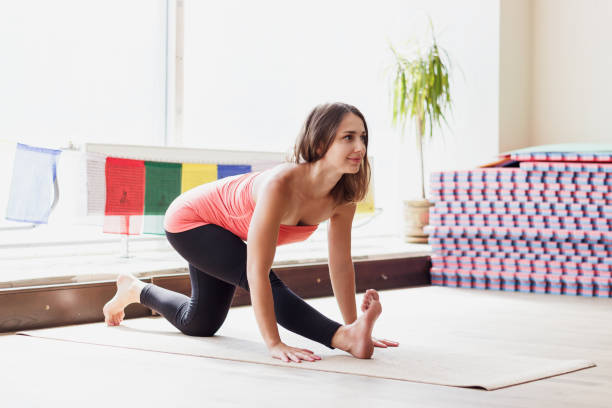 istock Woman makes yoga exercises 834758856