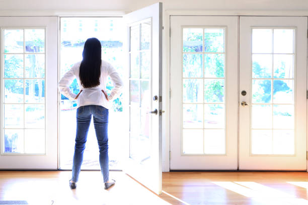 istock Hispanic Female Millennial Looks Outside 834759080
