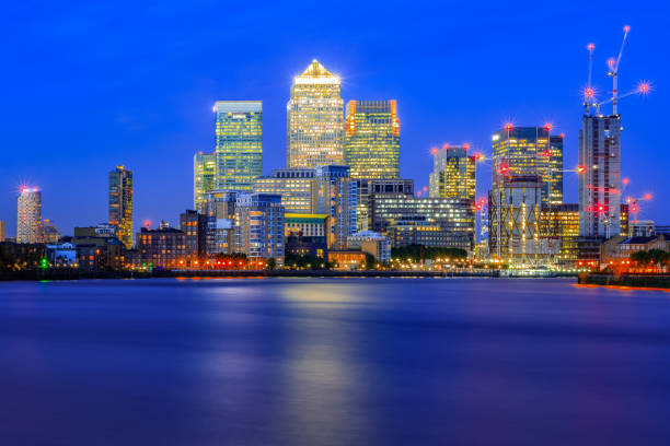 istock Long exposure, illuminated cityscape in Canary Wharf, London 834761506