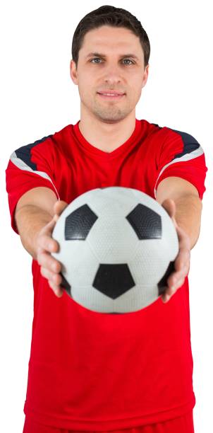 istock Handsome football player looking at camera 834763886