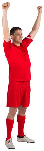 istock Excited football player cheering 834764620