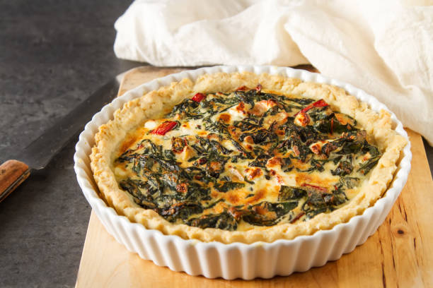 istock Homemade cheese Quiche egg for brunch with spinach and chard 834764972