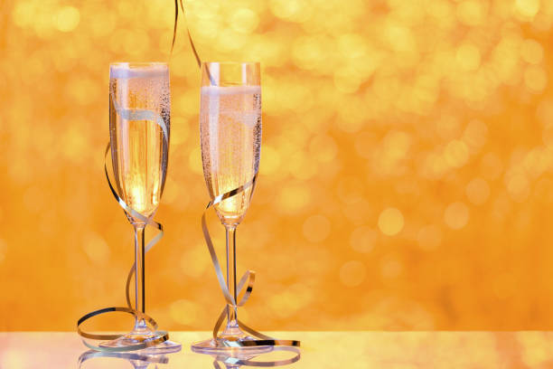istock Two champagne glasses wrapped with ribbon as a decoration 834779318