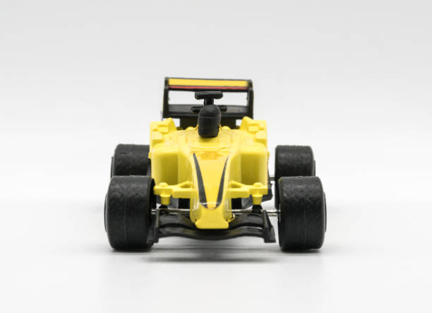 istock Yellow toy as formula car isolated on white 834781788
