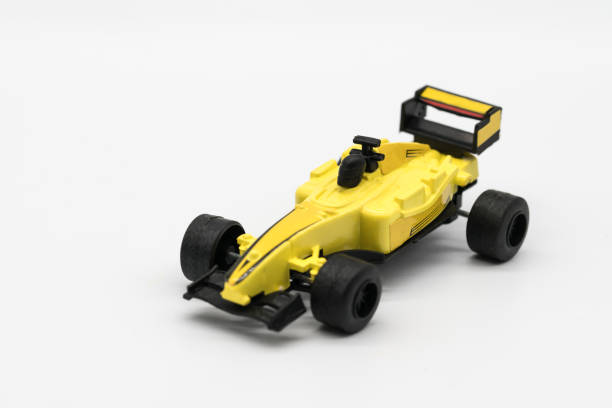 istock Yellow toy as formula car isolated on white 834781794