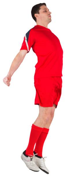 istock Fit football player jumping up 834789130