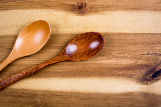 istock Wooden spoons on cutting board 834789458