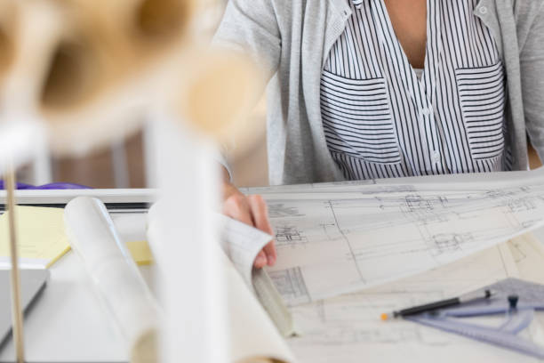 istock Unrecognizable female architect is busy in her studio 834794870