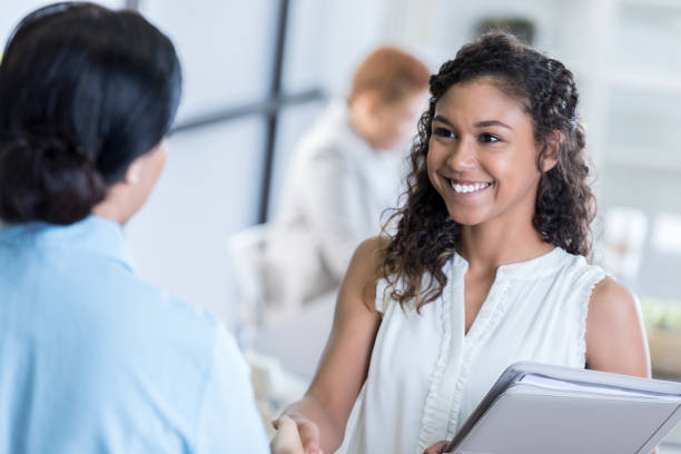 istock Young businesswoman shakes hands before interview 834795374