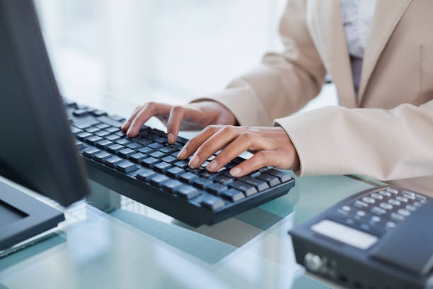 istock Close up on businesswoman typing on her keyboard 834798728