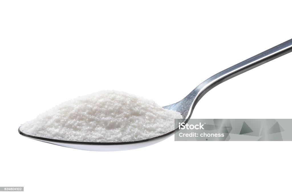 Spoon of sugar isolated on white background Sugar - Food Stock Photo