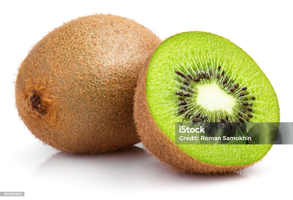whole kiwi fruit and half kiwi fruit on white Ripe whole kiwi fruit and half kiwi fruit isolated on white background Kiwi Fruit Stock Photo