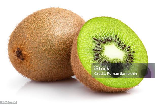 Whole Kiwi Fruit And Half Kiwi Fruit On White Stock Photo - Download Image Now - Kiwi Fruit, White Background, Cut Out