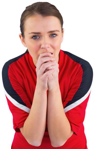 istock Nervous football fan in red 834809438