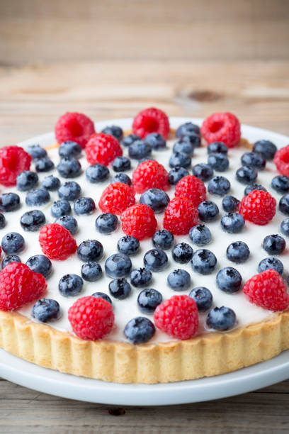 istock Cake with blueberries and raspberries. Confectionery product 834816590