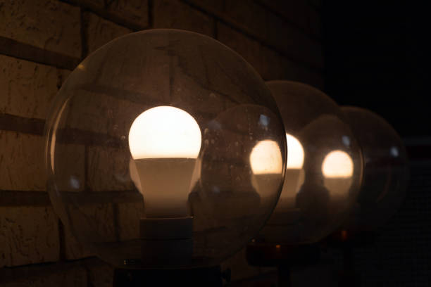 istock Lamps in brick wall 834816858