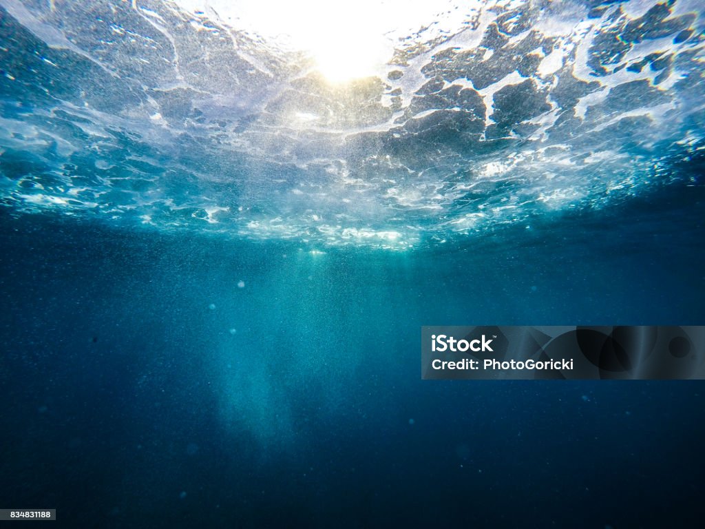 Underwater Photo of underwater light Sea Stock Photo