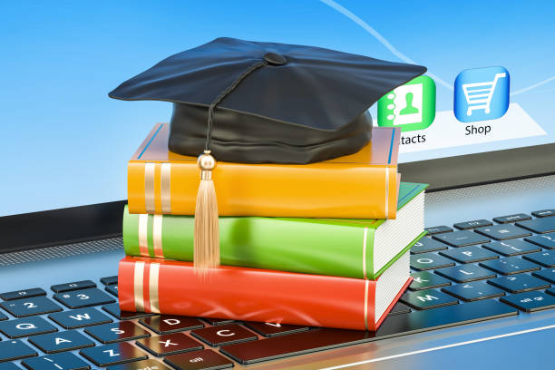 istock education concept, books with graduation cap on laptop keyboard, 3D rendering 834834678