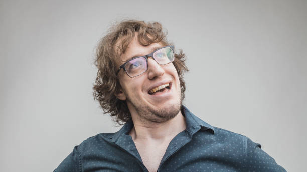 istock happy and proud man portrait on gray 834834914