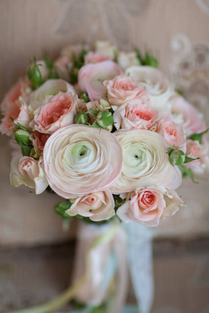 istock Elegant wedding flower bridal bouqet on texture sofa 834849806