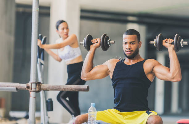 istock Young people exercising in an urban gym 834850130