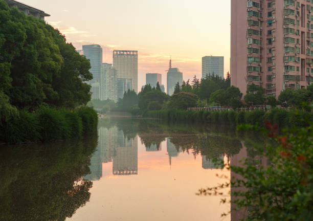 istock park along canal in town 834858826