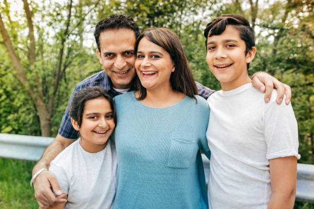 istock Two parents and two kids 834859120