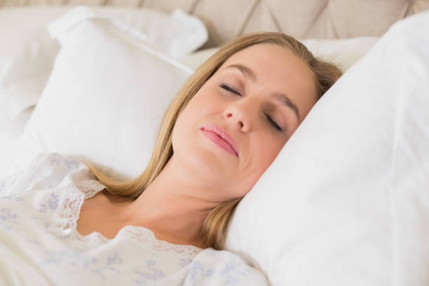 istock Natural content woman slumbering in bed 834870864