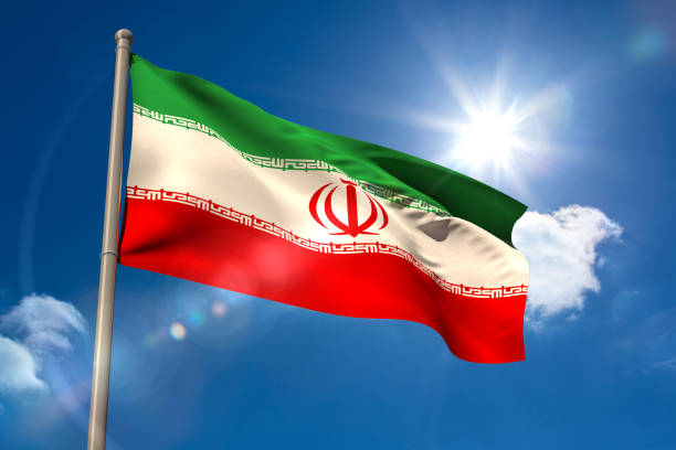 istock Iran national flag on flagpole 834874290