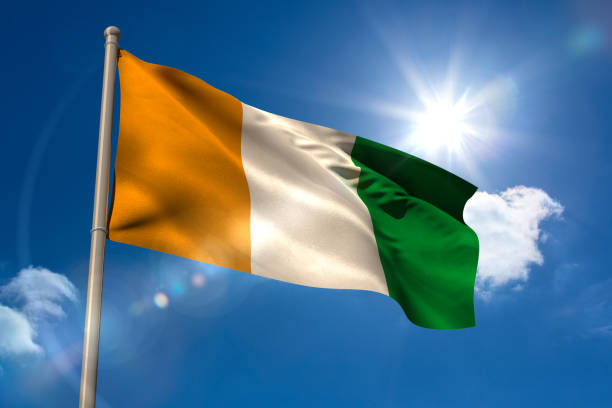 istock Ivory coast national flag on flagpole 834874442
