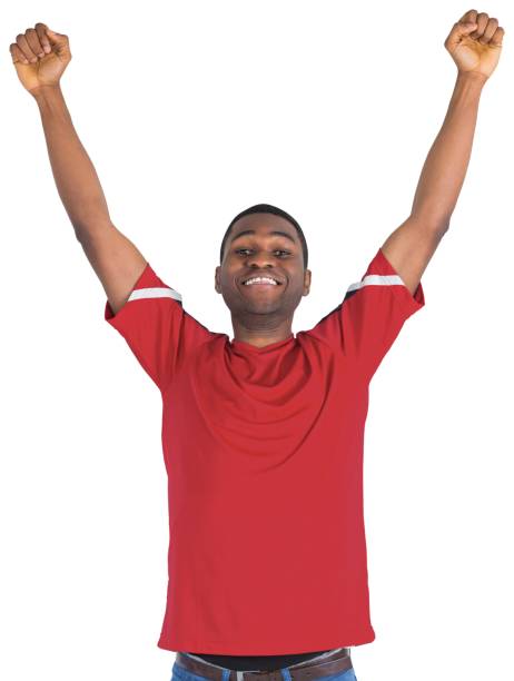 istock Excited handsome football fan cheering 834875452