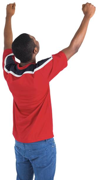 istock Excited handsome football fan cheering 834876306