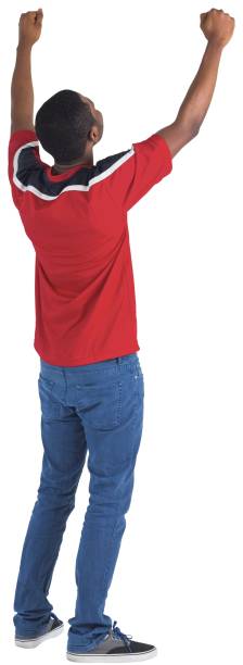 Excited handsome football fan cheering