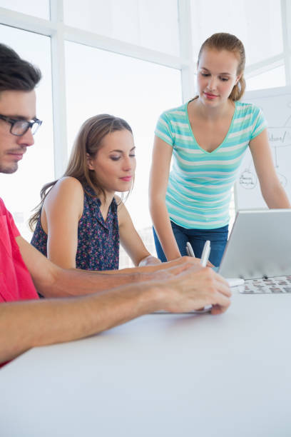 istock Casual business people in office at presentation 834883392